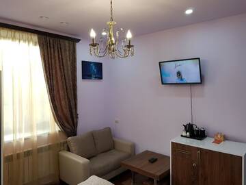 Фото номера Семейный двухместный номер с 1 кроватью Отель Ahana Hotel г. Martuni 4